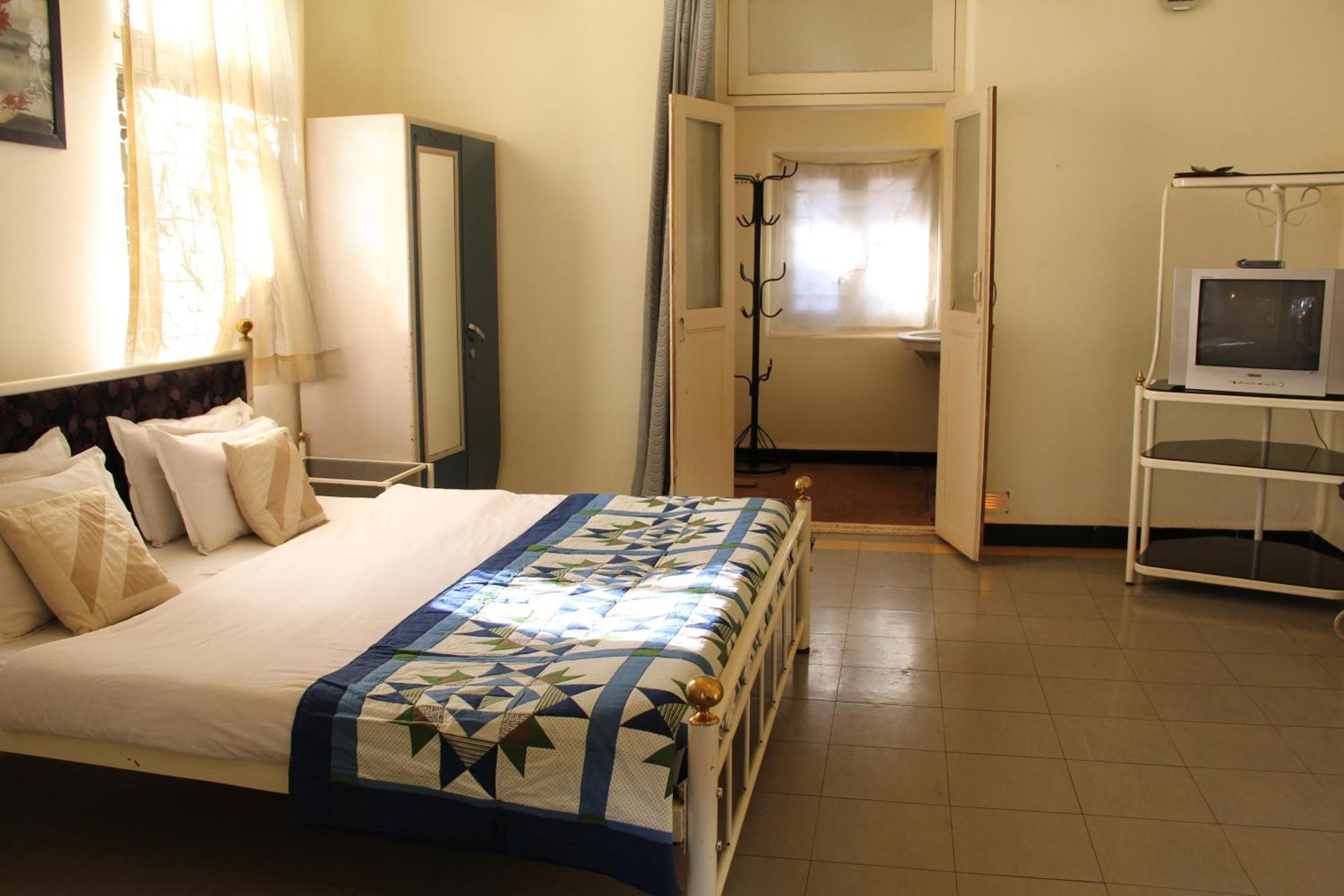 Hotel Malas Панчгани Стая снимка